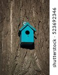 Blue Bird House On Tree At The...