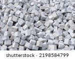 Granite paving stones in typical cube shape