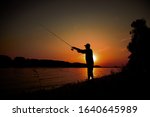 Men Fishing On The River...