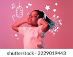 Small photo of Creative design. Portrait of little beautiful african girl listening to music over pink background in neon light. Future singer. Concept of imagination, childhood, motherhood, creativity, dreams, ad