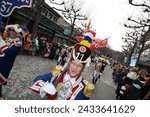 Small photo of Mainz, Germany - February 10, 2024: Traditionally, every year at 14.11 at the carnival season is opened in Mainz by shouting 3x "Helau" and celebrating on the streets with kids, Der Jugendmaskenzug.