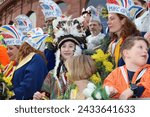 Small photo of Mainz, Germany - February 10, 2024: Traditionally, every year at 14.11 at the carnival season is opened in Mainz by shouting 3x "Helau" and celebrating on the streets with kids, Der Jugendmaskenzug.