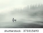Man Fishing On A Boat In A...