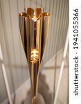 Small photo of TOKYO, JAPAN - JANUARY 6, 2021 : The Olympic torch of the Tokyo 2020 Olympic Games. The torch relay starts on March 25 and passes throughout Japan before arriving Tokyo on July 9.