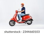 a man wearing a helmet and riding a motorbike