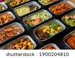 Business lunch in eco plastic container ready for delivery.Top view. Office Lunch boxes with food ready to go. Food takes away. Catering, brakfast. 