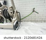 Snow Covered Hose Reel Mobile...