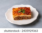 Small photo of Moussaka - A traditional Greek dish