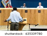 Small photo of AUSTIN - CIRCA FEBRUARY 2016: Citizens of Austin, Texas attend and speak at a public hearing to discuss the future of Uber and Lyft ride hailing services in the city at City Hall in downtown.
