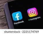 Small photo of Facebook and Instagram apps seen on the screen of smartphone. Concept. Stafford, United Kingdom, October 30, 2022