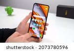 Small photo of Berlin, 11 November 2021: Xiaomi Poco F3 - High Tech Smartphone With Big Screen And Modern Design. Concept For Mobile Phone, Communication And Technology