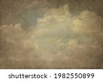 Art illustration.  Handmade textured backdrop. Vintage background. Old paper background. The clouds. Sepia. Blank. Aged wallpaper for card. Template for design. Textured.