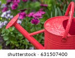 Closeup Of Red Watering Can In...