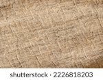 Small photo of Natural uncolored sacking burlap background. Hessian sack canvas woven texture