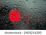 Small photo of Abstract background for the banner. One night lights of city transport were seen through the windshield in rainy weather. Concept of threat, danger, hazard, peril, menace, jeopardy, imminence