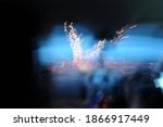 light is like a spark but it is not. This is a light picture of a lamp using low shutterspeed. It looks likefireworks. 