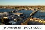 Establishing shot of Sturgeon Bay city in Door county, Wisconsin. Aerial view of American town. Sunny morning, sunrise. Spring summer season.