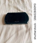 Small photo of Dusty vintage PSP Go by Sony.