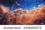 Small photo of Cosmic Cliffs in the Carina Nebula. James Webb Space Telescope. Glittering Landscape of Star Birth. Elements of this image furnished by NASA.