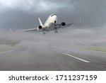 Passenger airplane leaving for the second go around, after an unsuccessful attempt to landing in bad weather, low visibility in the fog