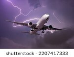 Landing airliner during a strong wind in a storm against the backdrop of a flash of lightning