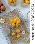Small photo of Selective focus Nastar Cookies, Pineapple tarts or nanas tart are small, bite-size pastries filled or topped with pineapple jam, commonly found when Hari Raya or Eid Al Fitr or Eid Al Adha.