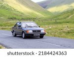 Small photo of Birkhill, Scotland - JUNE 25, 2022: 1984 Talbot Horizon saloon car in a classic car rally en route towards the town of Moffat, Dumfries and Galloway