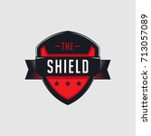 red glossy sleek shield emblem... | Shutterstock .eps vector #713057089