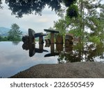 Small photo of bandung-indonesia-july 1 2023: wot batu. one of the tourist attractions in Bandung. contains artwork from sunaryo. stone carving art that has a philosophy of spiritual and transcendental journey