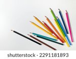 Arrangement Color pencils set in bulk on isolated white background