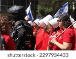 Small photo of Tel Aviv, Israel - May 4, 2023: Demonstrators rallied in front of Rabbinical Court, 33 King David Blvd, protesting against the judicial reform. Political performance inspired by the Handmaid's Tale.