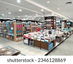 Small photo of Jakarta, Indonesia - July 20, 2023: Book shelves at Gramedia Store, Jakarta. Gramedia is the bigger bookstore in Indonesia, It has a wide range of book references available for sale.