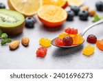 Small photo of Chewable gummy bears vitamins and supplements and fresh fruits
