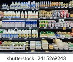 Small photo of LATVIA, RIGA, 10, JANUARY, 2024: Delicious and healthy bio dairy products on shelf of supermarket. Natural products without milk fat substitute. Food quality concept.