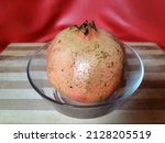 Small photo of Fresh Pomegranate in the plets beautiful colours,September,21,2021:saudi arabia.