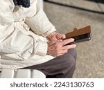 Close Up Of An Elderly Woman's...
