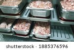 Small photo of Frozen poultry being defrosted in a dedicated thawing chiller in an industrial kitchen