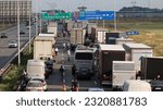 Small photo of 06.20.2023 wroclaw, poland, Cars stand in a traffic jam on the highway after a foray on the road.