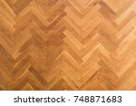 wooden floor background - herringbone parquet background -