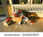 Small photo of Talibura, Flores, Indonesia - January 28 2024 : Scattered rubbish resulting from food and soft drink packaging, rubbish strewn in the yard, household rubbish