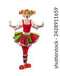 Small photo of Funny female clown. Entertainer woman Joker in colorful suit and wig. Buffoon with clown whiteface makeup. Trickster, jester, pantomime, mime. Professional actor