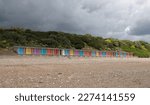 A Row Of Colourful Beach Huts...