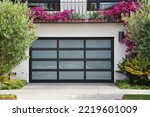 Small photo of Unique Garage Door Design Ideas to Make Your Home Stand Out, create and customize the perfect wood garage door. From wood type and glass to paint and finish