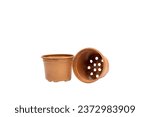Brown plastic flowerpot plant pot on white background