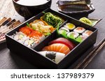 Bento Box With Sushi And Rolls