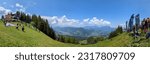 Small photo of Kitzbuhel,Austrial-June 8 2023:Red Bull X-Alps 2023 Prologue take off site above historical town of Kitzbuhel in austrian Alps