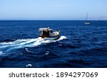 Motorboat. Small Boat Breaking...