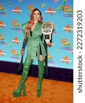 Small photo of Becky Lynch at the Nickelodeon Kids' Choice Awards 2023 held at the Microsoft Theater in Los Angeles, USA on March 4, 2023.