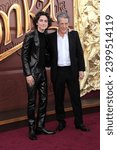 Small photo of Timothee Chalamet and Hugh Grant at the Los Angeles premiere of 'Wonka' held at the Regency Village Theater in Westwood, USA on December 10, 2023.
