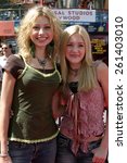 Small photo of Alyson Michalka and Amanda Michalka 'Aly & AJ' at the "Thunderbirds" Premiere held at the Universal Studios Cinemas in Universal City, California United States on July 24, 2004.